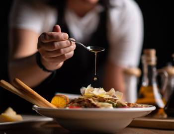 Chef plating dish at restaurant 