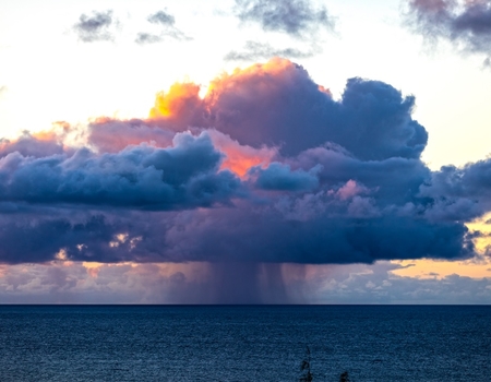 rain over the ocean off coast of Kauai