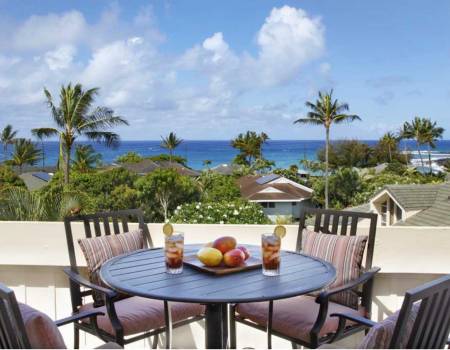 A round table overlooking the Pacific Ocean at a Kauai vacation rental