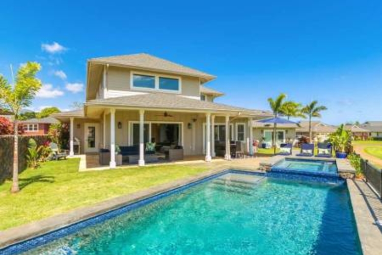 a large house with a private pool in poipu