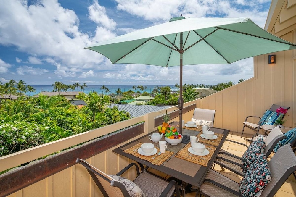 Lanai overlooking Poipu Beach at a Kauai vacation rental