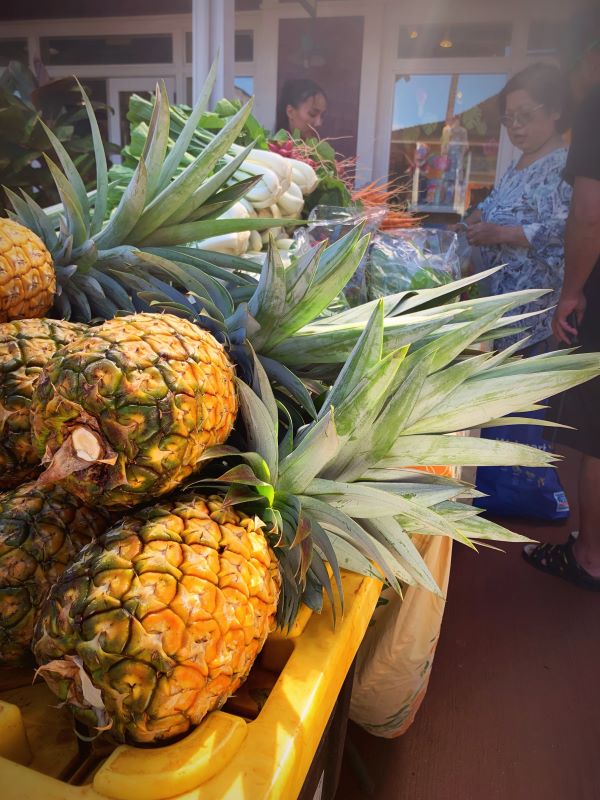 The Shops at Kukuiula Pineapples at Kauai Culinary Market